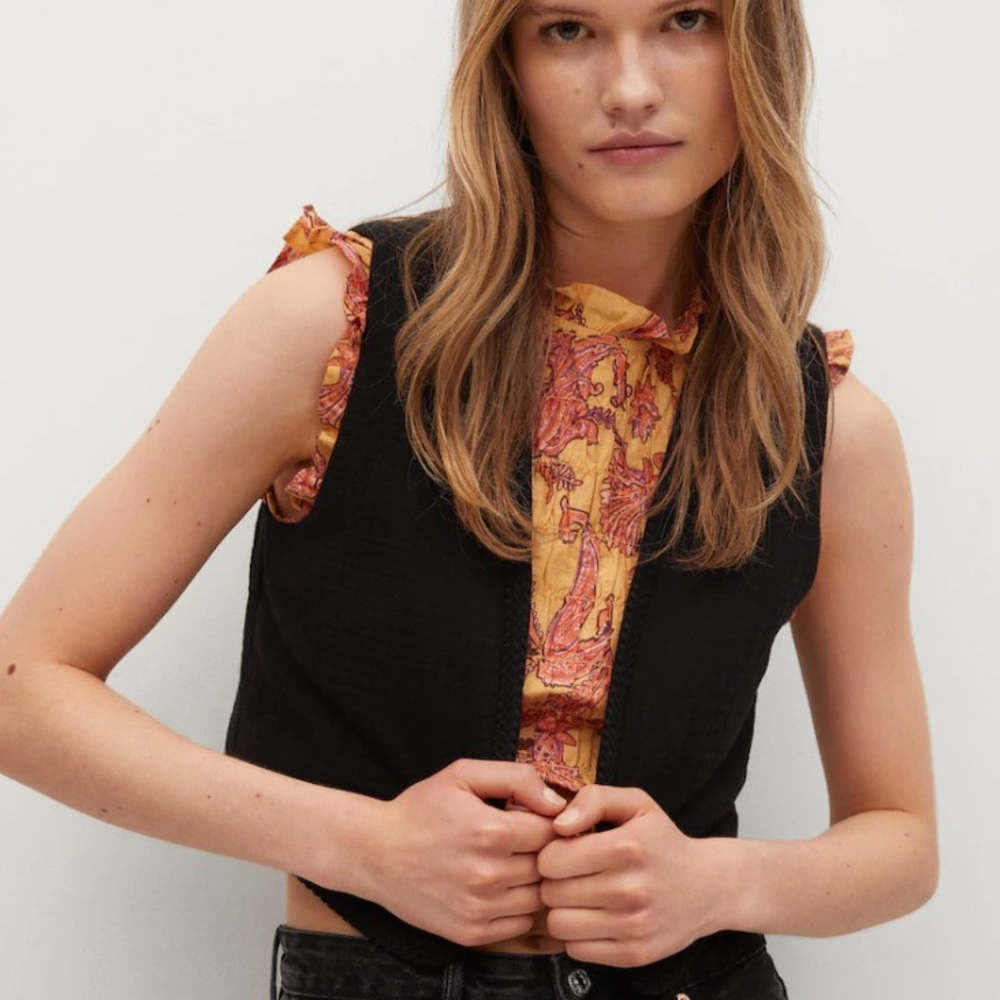 Black vest by Mango
